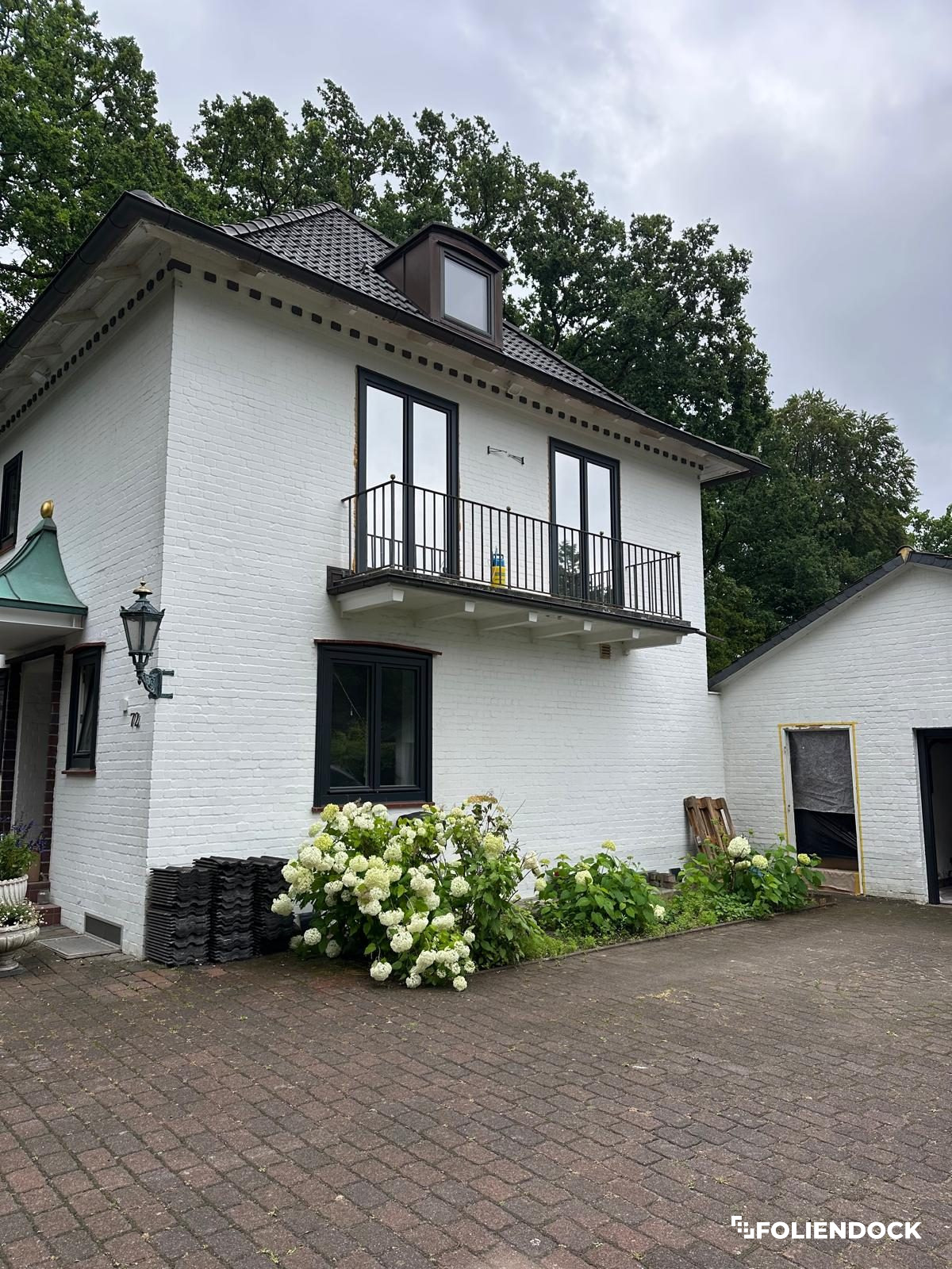 Einfamilienhaus bei Hamburg – Dachfenster nach der Folierung, Außenansicht